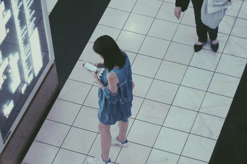 Using mobile to find best coupons while in shopping mall