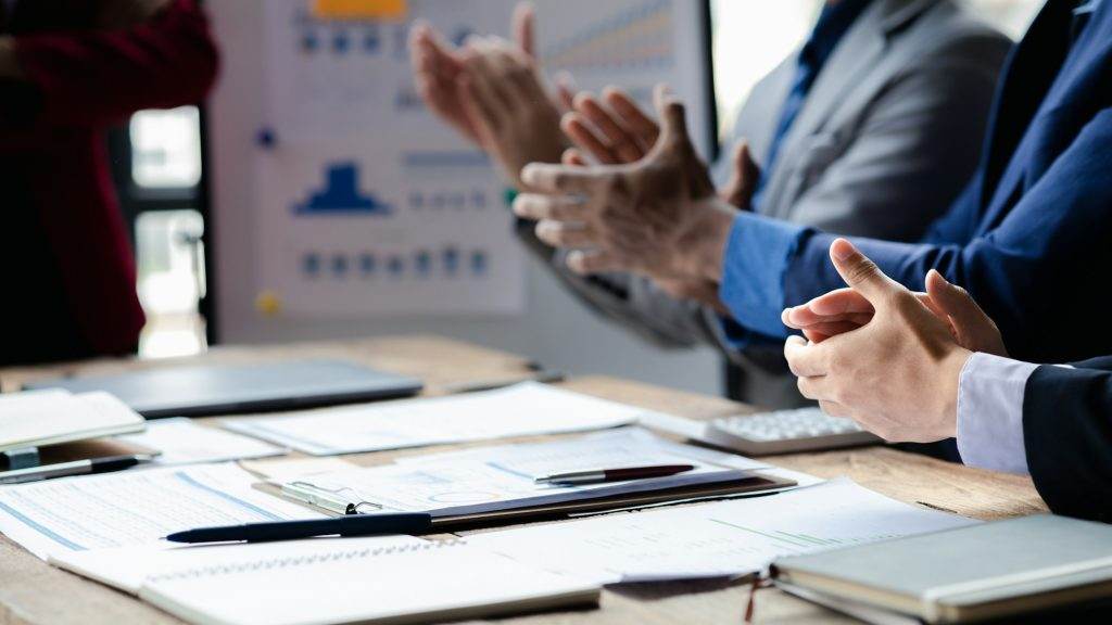 Group business people applauding at startup company meeting, business meetings, startup company sale