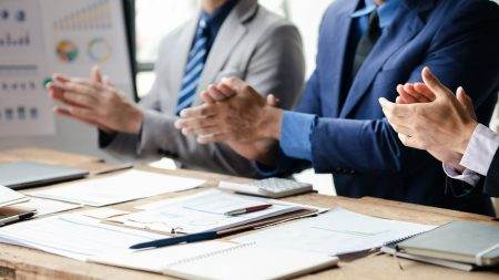 Group business people applauding at startup company meeting, business meetings, startup company sale