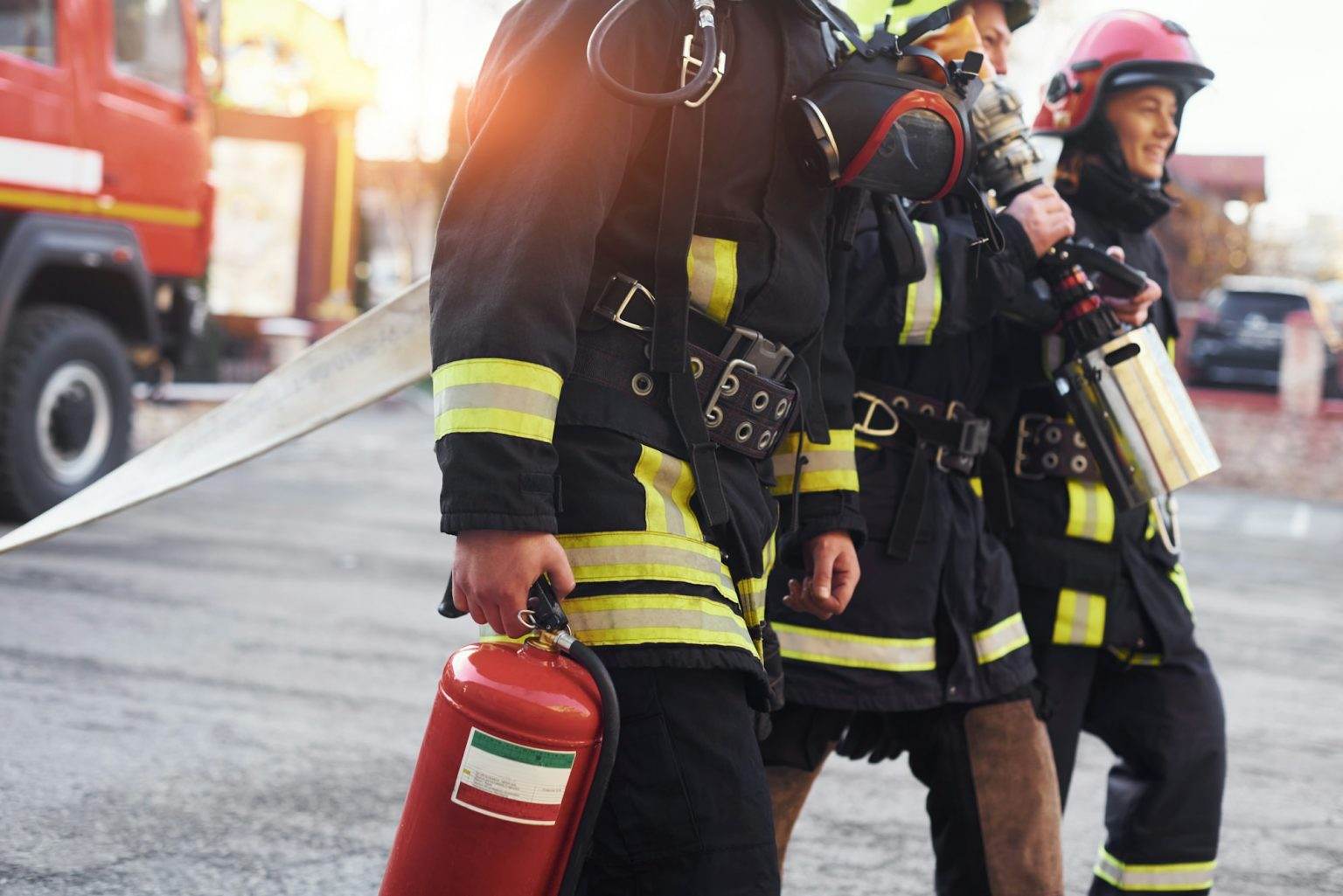 Group of firefighters in protective uniform that is on station