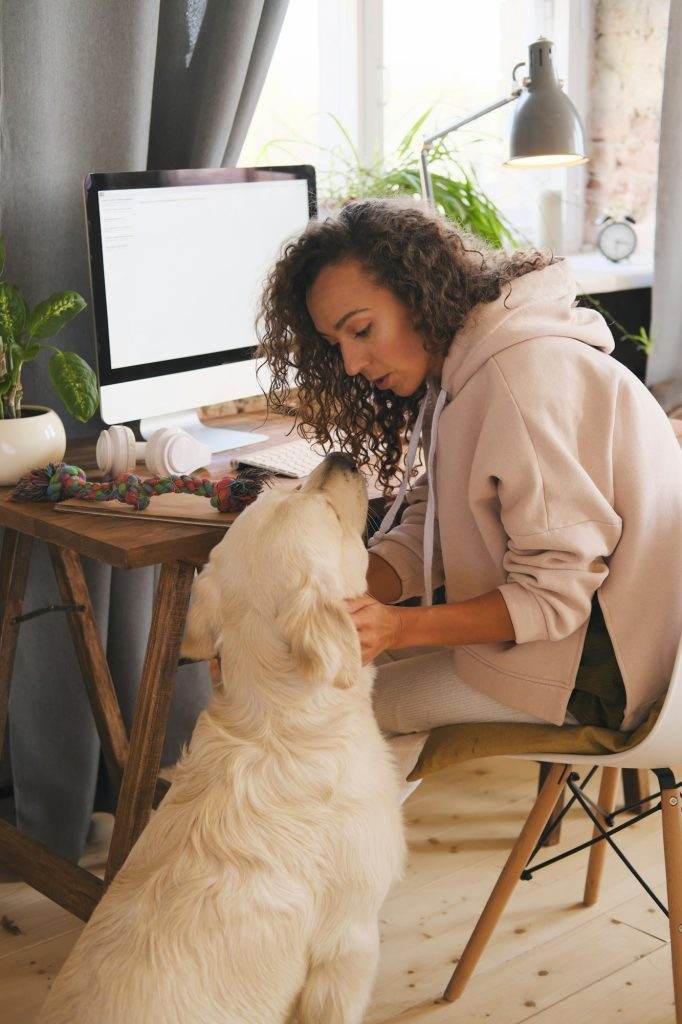 Woman with dog at home