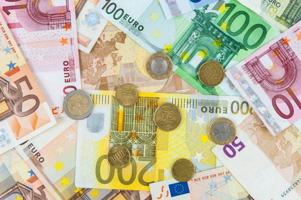 Background of euro banknotes and coins
