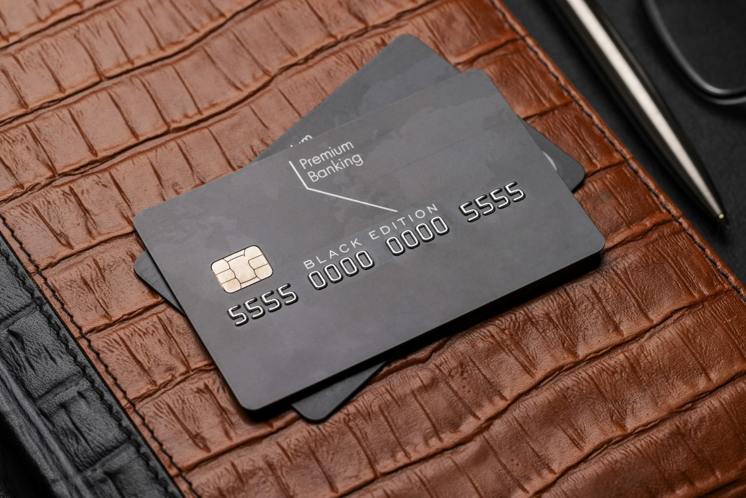 Black credit card on office table