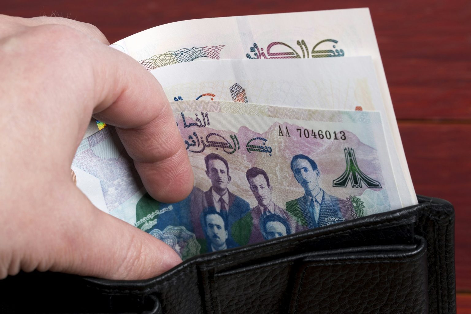 Algerian money in the black wallet