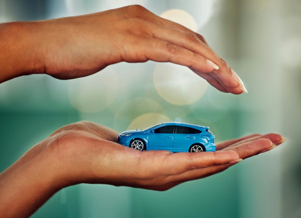 Car, insurance and hands for transport mockup, investment or loan with bokeh background. Invest, tr