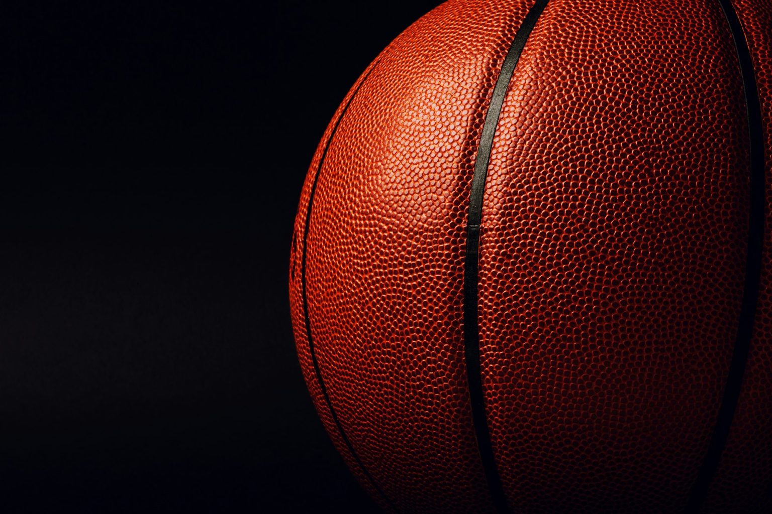 basketball ball on black background.