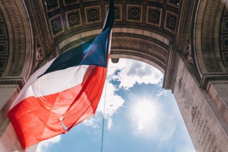 Paris flag and arc de triomphe