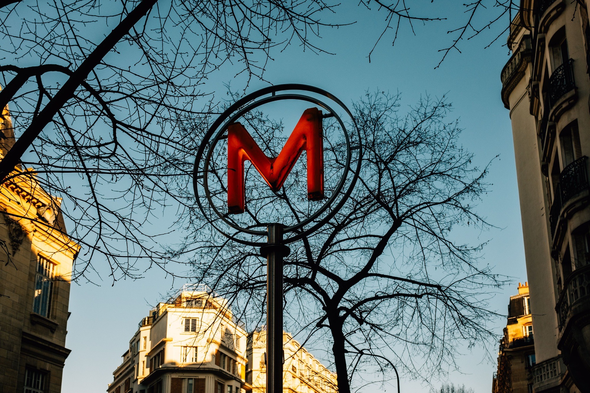Red metro sign in Paris.