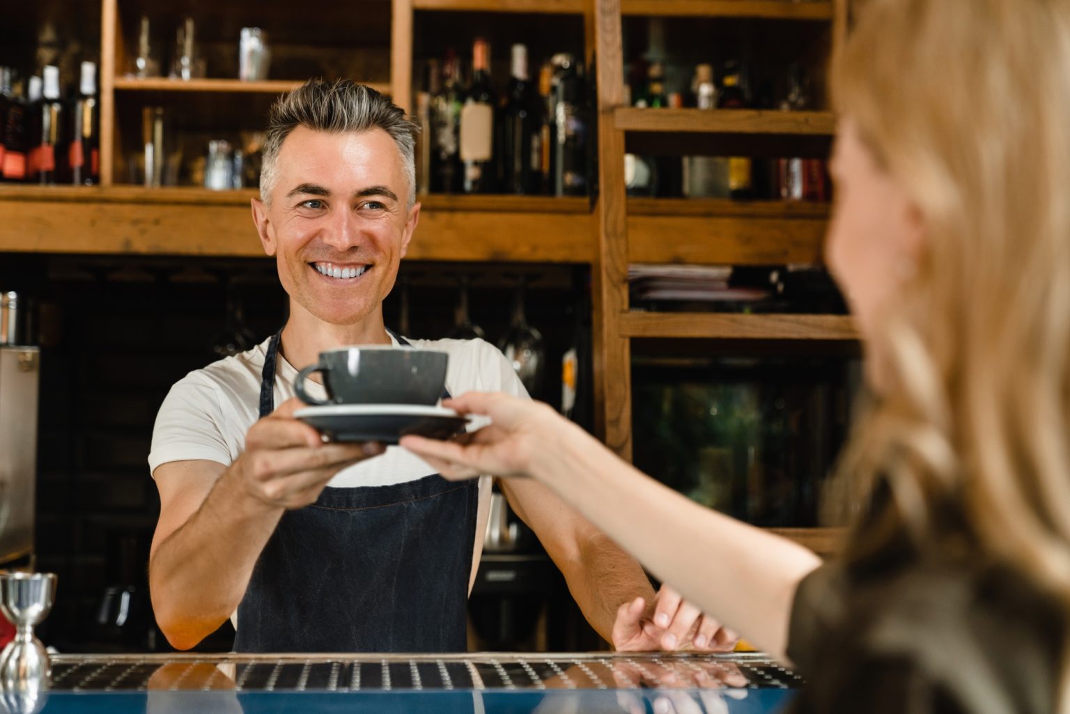 Micro ATMs while customer paying with credit card in bar restaurant cafe. E-commerce e-banking