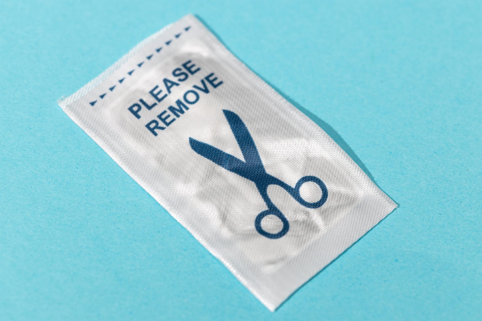 Retail security soft tag anti theft RFID isolated on blue background