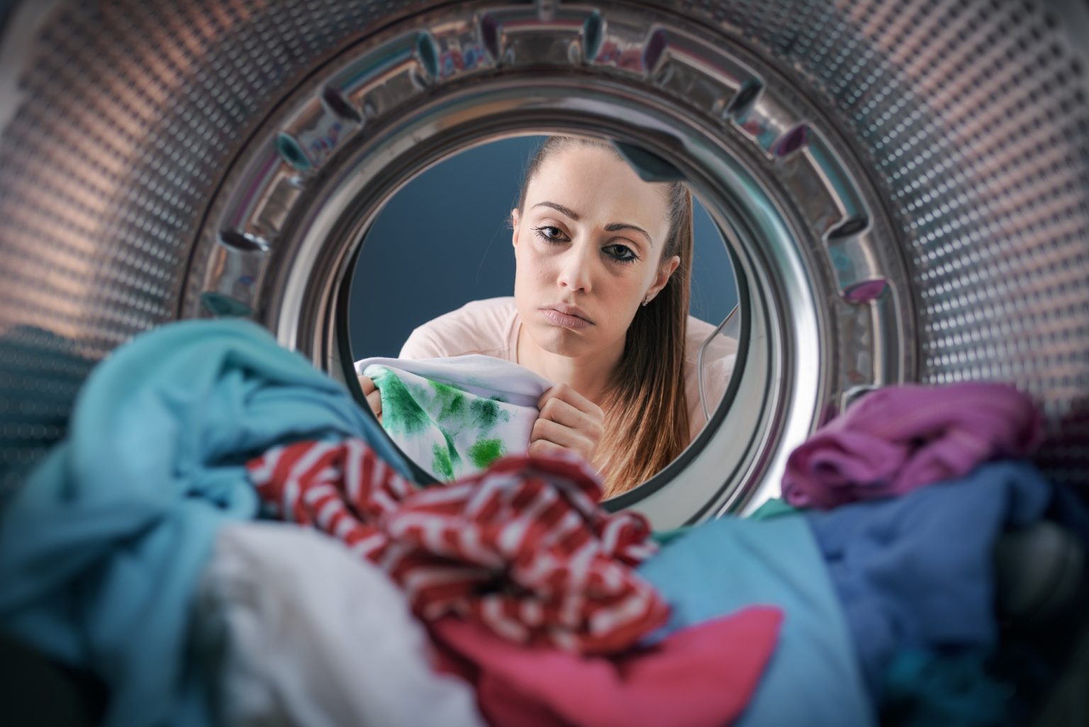 Woman finds stained clothes in the washing machine