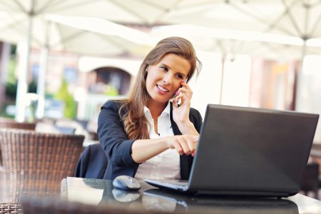 Young manager working in cafe