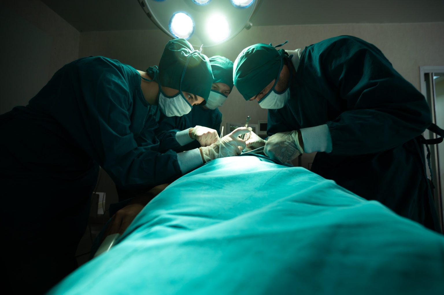 professional surgery team in the operating room, urgent surgery