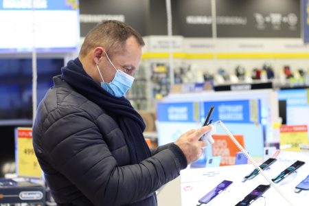 The man chooses the phone as a gift.