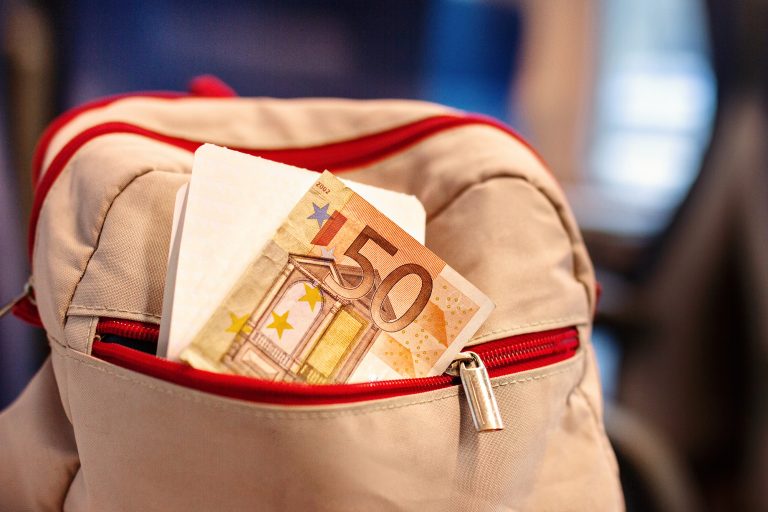 backpack with ticket, money 50 euros in pocket