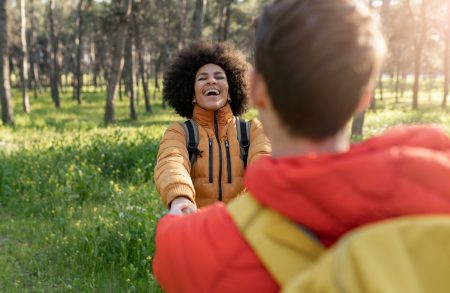 Dating in the park. Multiracial young couple