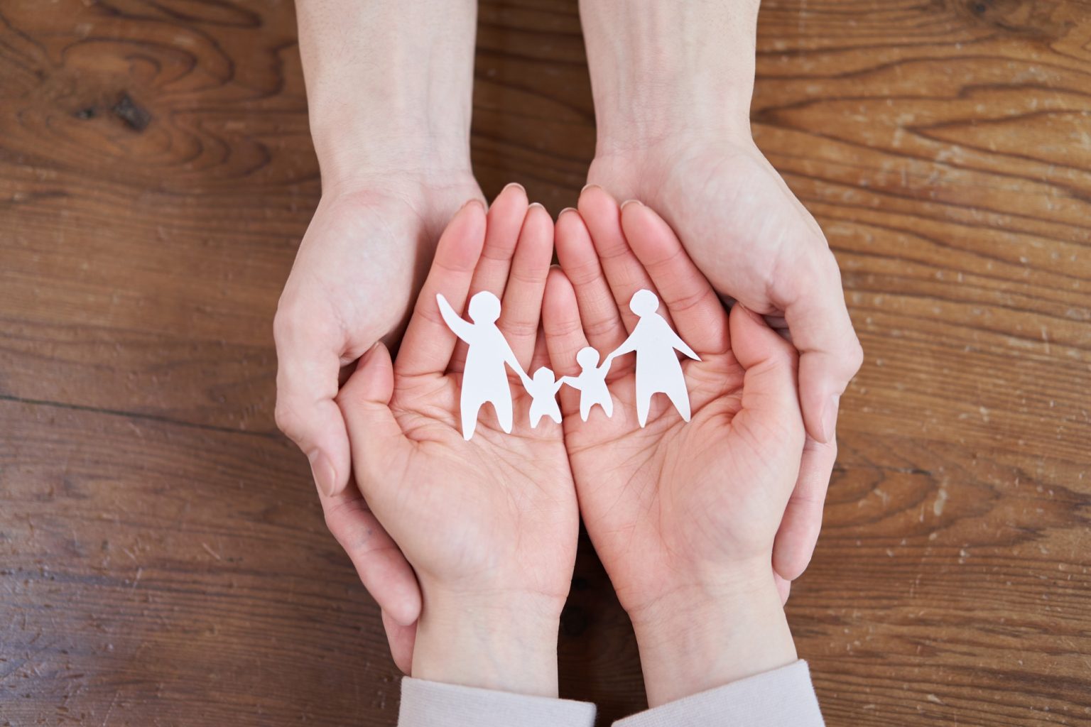 Asian men and women thinking about their families