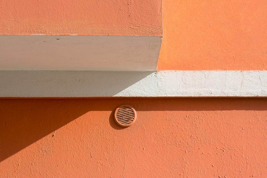 Modern gas boiler vent flue system on an exterior wall