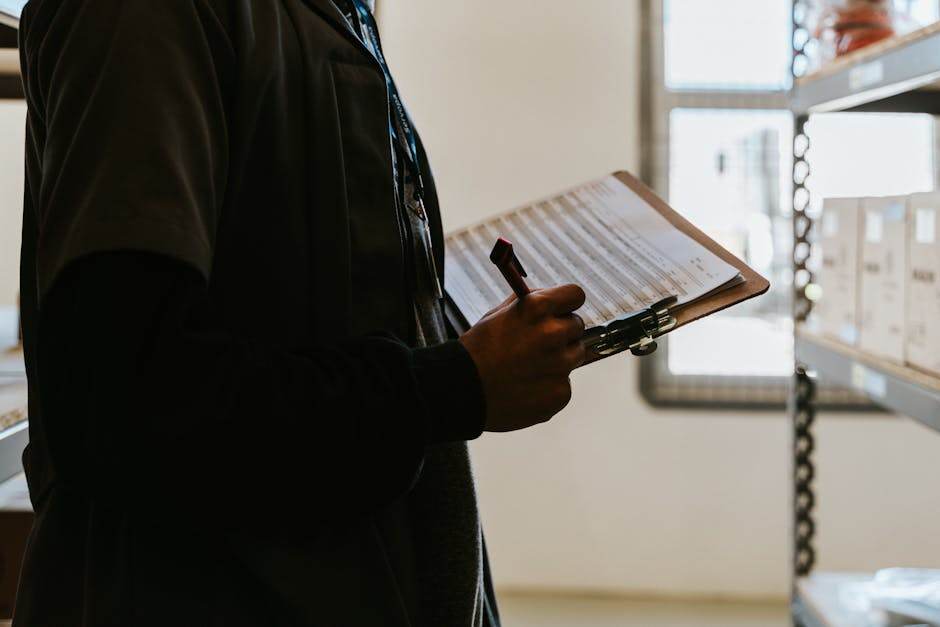 Tenant and landlord reviewing a rental property checklist during a move-out inspection