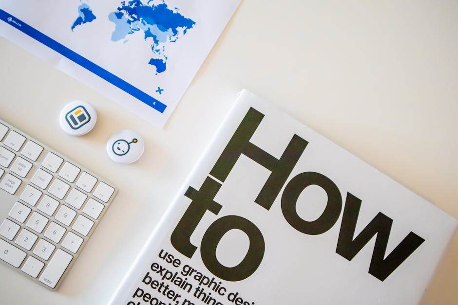 Résiliation des contrats lors d’un déménagement : guide complet 2026 Stylish desk setup with a how-to book, keyboard, and world map on paper.