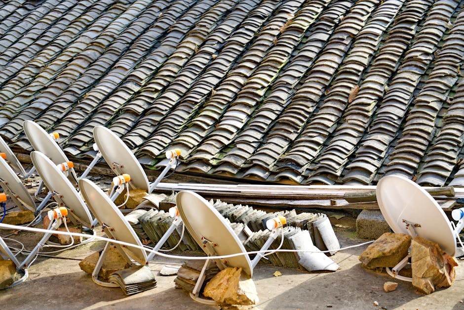 Satellite internet dish installed on a rural house roof