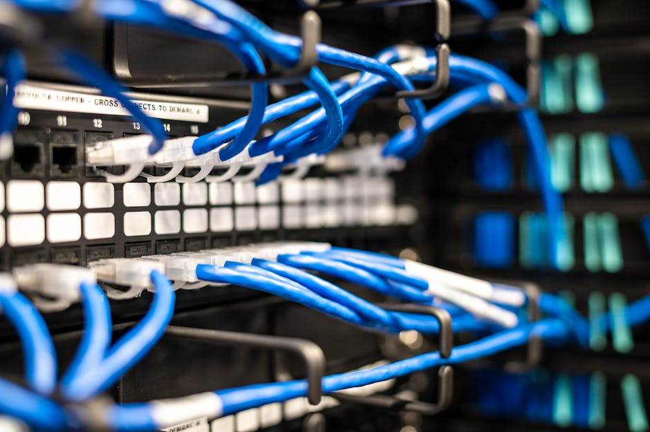 Technician connecting fiber internet equipment in a home