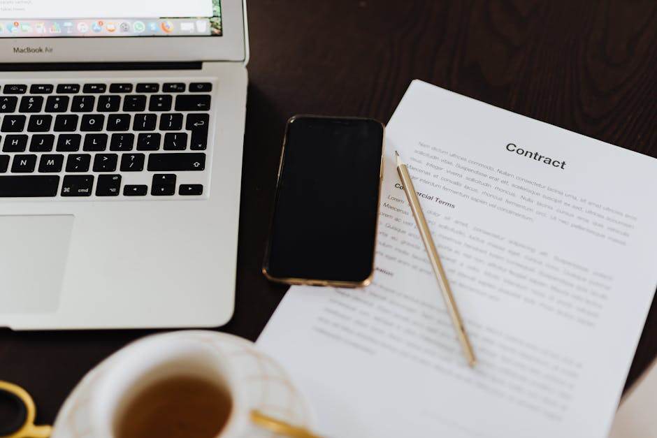 Person holding bank documents and reviewing a mortgage contract