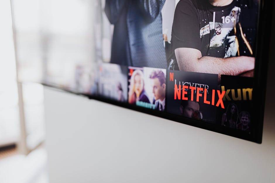 Netflix subscription pricing comparison on a laptop screen