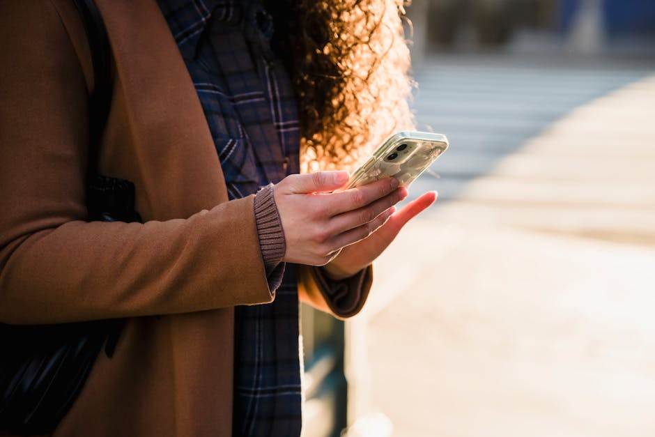 Traveler using smartphone and checking mobile network compatibility