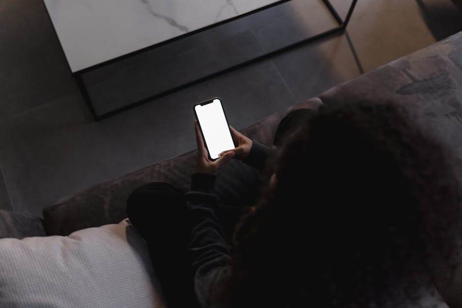 Person using smartphone on Wi-Fi at home