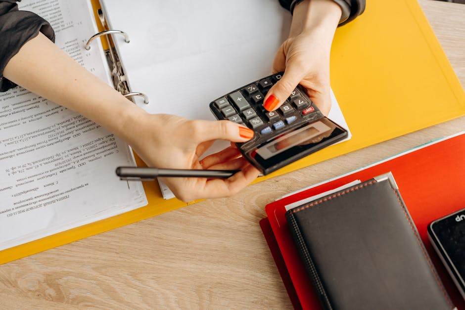 Healthcare policy discussion with documents and calculator