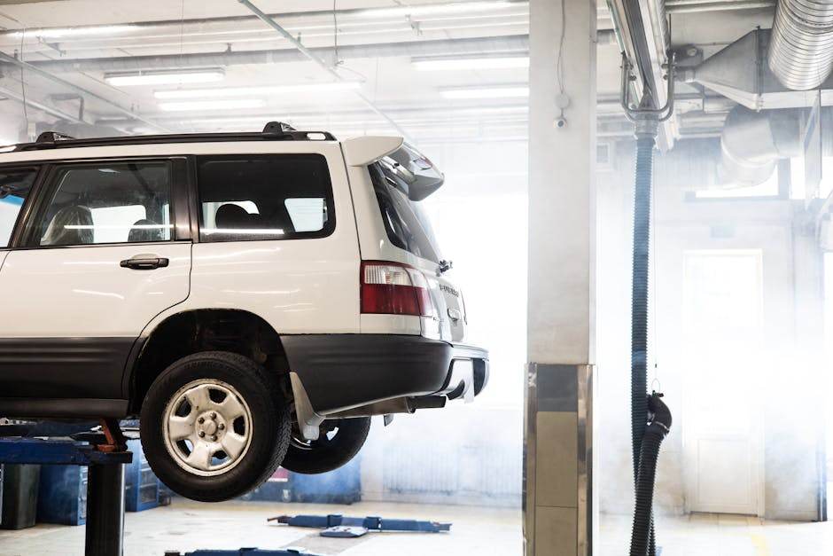 Person inspecting a car for scratches and wear before vehicle return
