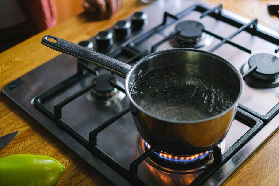 Gas stove flame in a modern kitchen