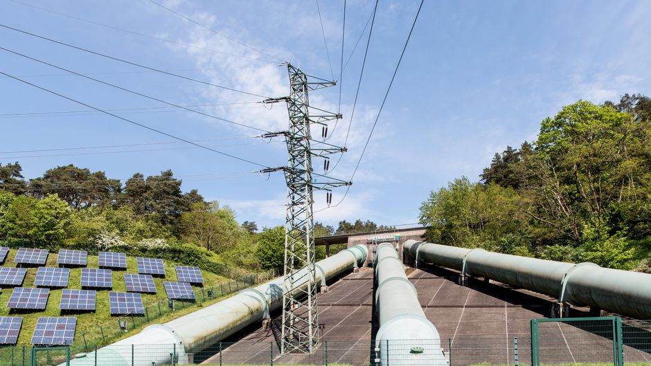Close-up of gas pipeline infrastructure and renewable energy concept