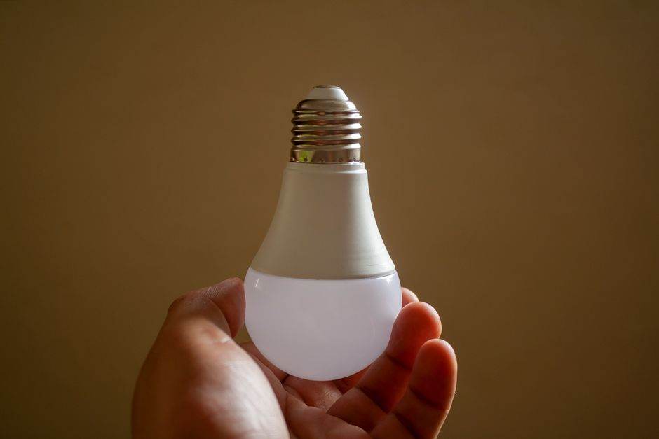 Home appliances and electricity bill concept with energy savings