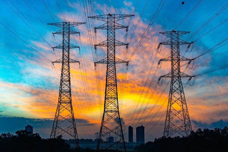 French electricity transmission lines at sunset