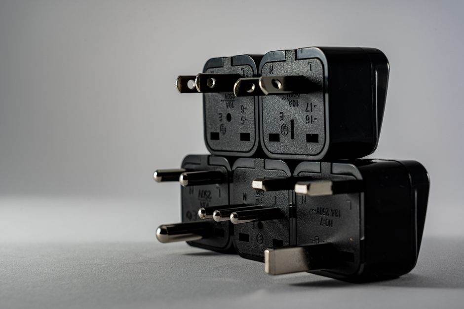 Smart plug connected to a wall outlet controlling home energy use