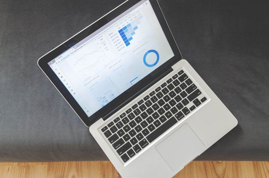 Person reviewing online comparison results on a laptop