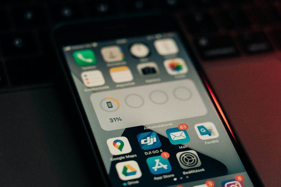 Smartphone showing electricity alert notification at home