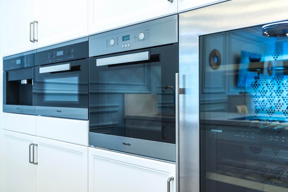 Household appliances running in a modern kitchen during the day