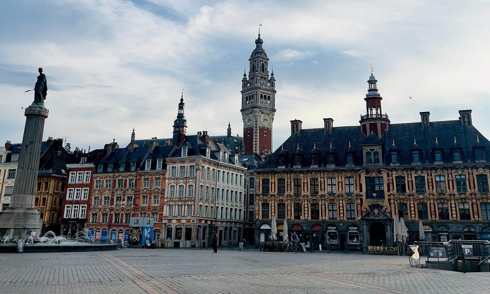 Grand square with historic buildings and monument