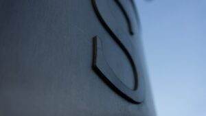 a close up of a clock face on a building