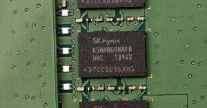 Detailed view of SK hynix DRAM chips on a green circuit board featuring electronic components.