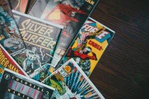 From above of huge collection of various retro comic books with colorful covers placed on floor