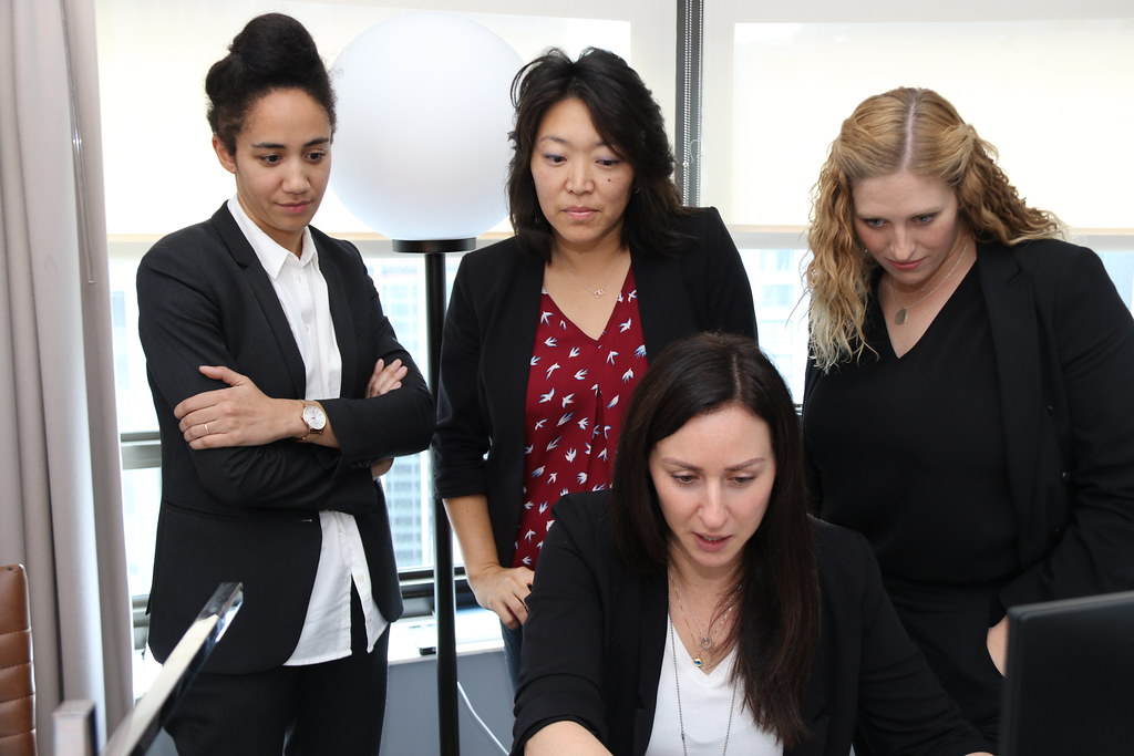 DSS special agents (left, second from left, center) and an investigative analyst (right) review incident reports from DSS protective details providing security around Manhattan during UNGA 73, September 26, 2018.